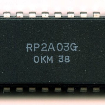 RP2A03G chip from NES, licensed under CC-BY-SA 3.0 from https://happytrees.org/chips/ic/Ricoh/RP2A03G
